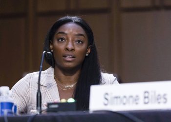 United States Olympic gymnast Simone Biles testifies during a Senate Judiciary hearing about the Inspector General's report on the FBI's handling of the Larry Nassar investigation on Capitol Hill, Wednesday, Sept. 15, 2021, in Washington. Nassar was charged in 2016 with federal child pornography offenses and sexual abuse charges in Michigan. He is now serving decades in prison after hundreds of girls and women said he sexually abused them under the guise of medical treatment when he worked for Michigan State and Indiana-based USA Gymnastics, which trains Olympians. (Graeme Jennings/Pool via AP)