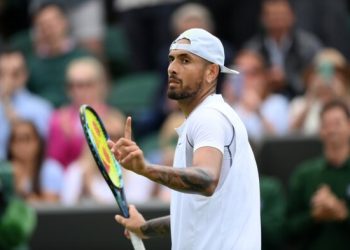 LONDON, ENGLAND - JUNE 30: Nick Kyrgios of Australia celebrates winning match point against Filip Krajinovic of Serbia during their Men's Singles Second Round match on day four of The Championships Wimbledon 2022 at All England Lawn Tennis and Croquet Club on June 30, 2022 in London, England. (Photo by Shaun Botterill/Getty Images)
