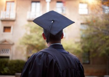 Thinking graduate, man or vision on university campus, college event or school graduation ceremony and future goals. Graduation cap, robe or student with education, learning or employment innocation